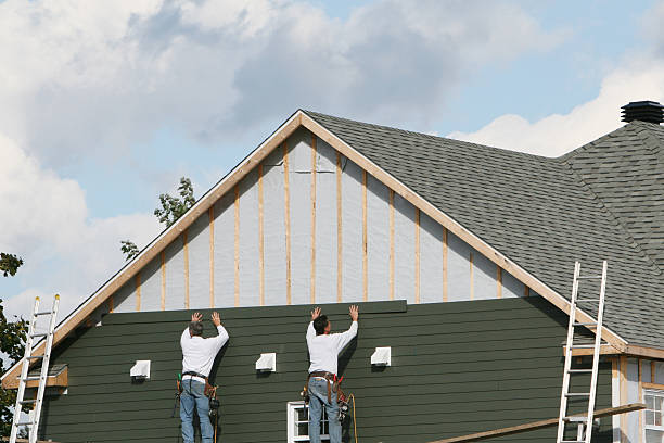 Professional Storm Damage Siding Repair technician working in Georgetown, TX